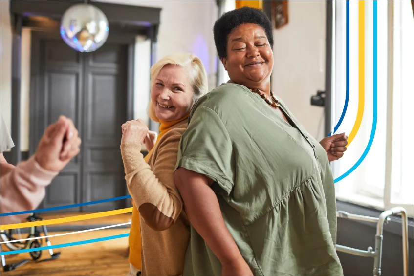 Seniors dancing at a party protected by Guaranteed Acceptance life insurance