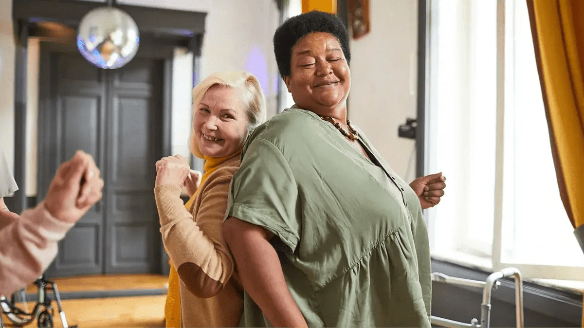 Seniors dancing at a party protected by Guaranteed Acceptance life insurance