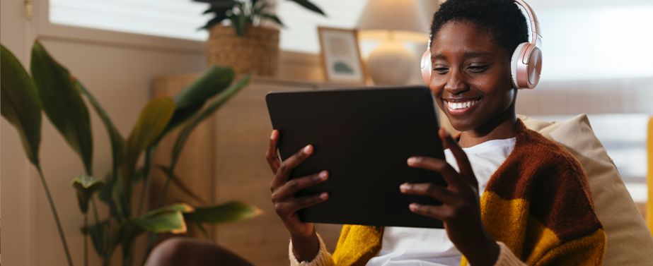Woman reviewing life insurance options on her tablet
