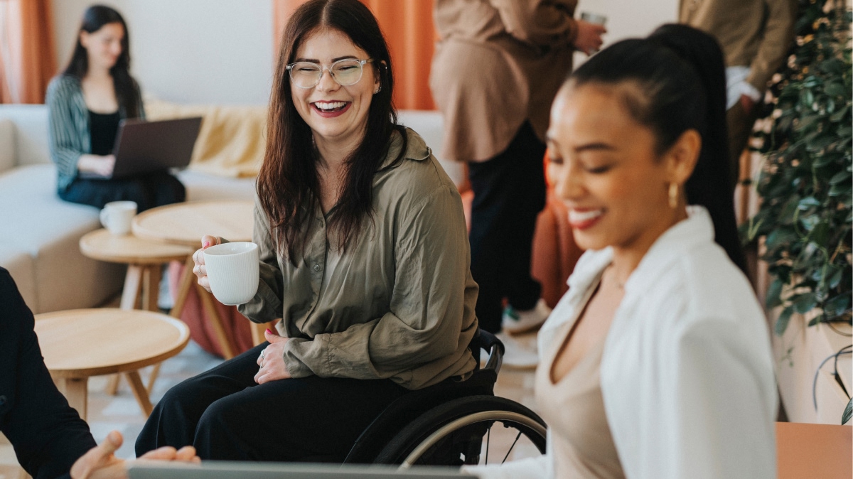 Employee in a wheelchair reviewing her Group Benefits coverage