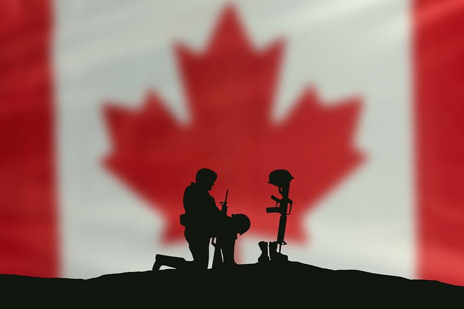 Soldier and Canadian Flag